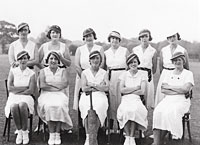 Black and white picture of a group of women posing for the camera