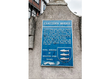 Information plaque set into the brick parapet
